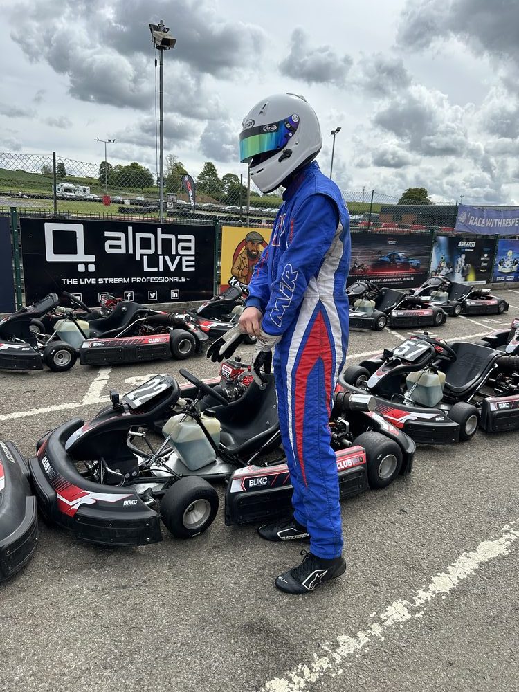 Robert Crawford in race suit on the grid at Club 100