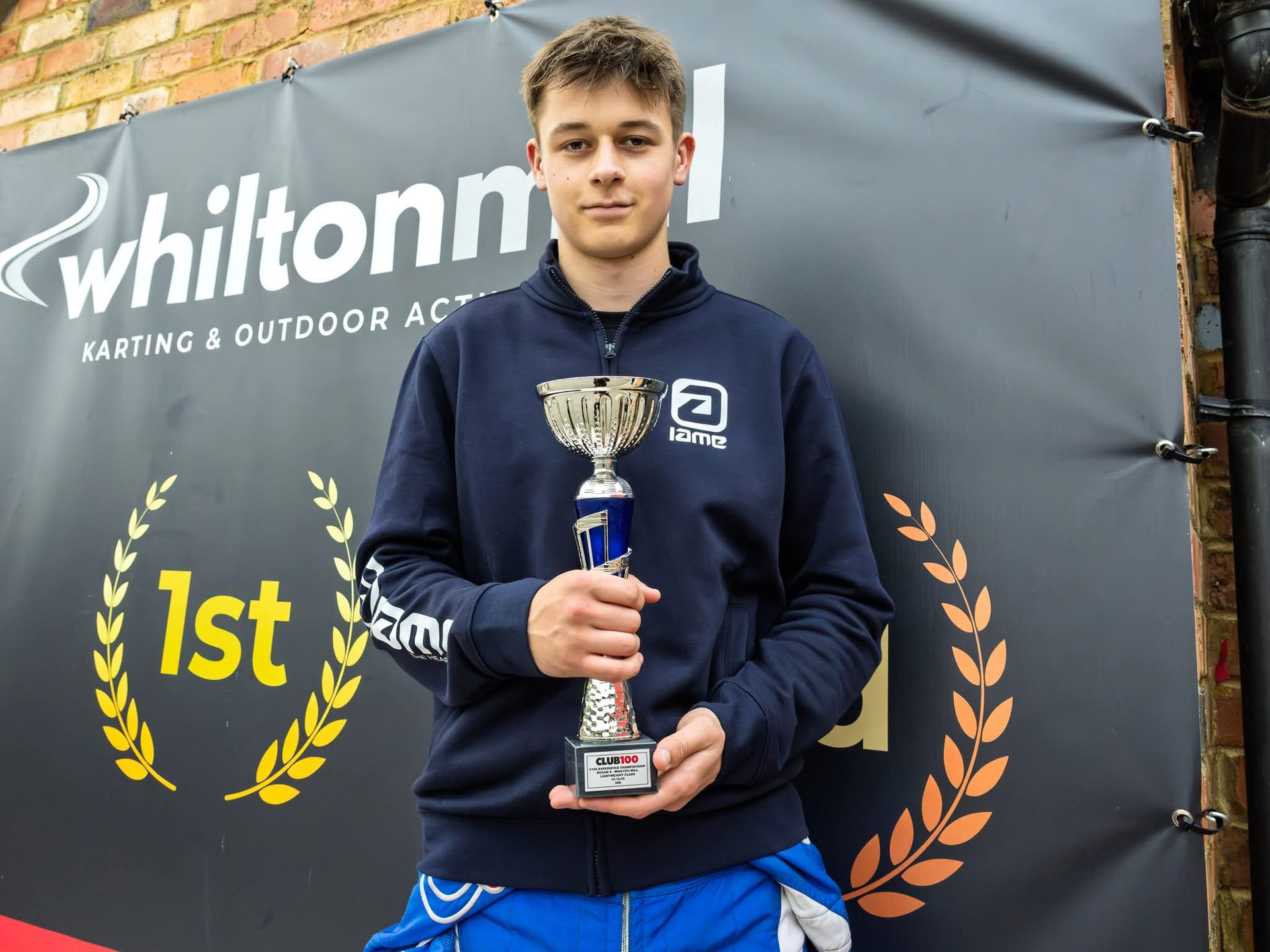 Robert Crawford with Club 100 trophy at Whilton Mill podium