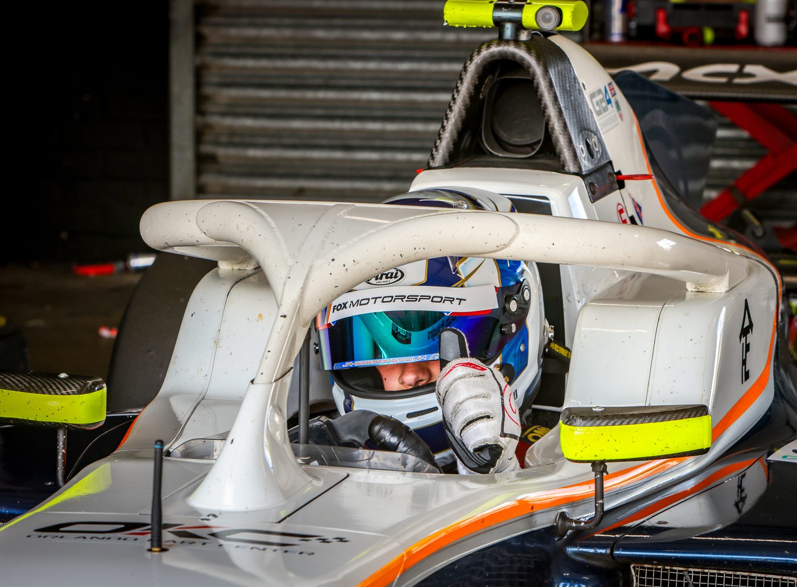 Robert Crawford strapped into the GB4 car in the Fox Motorsport garage