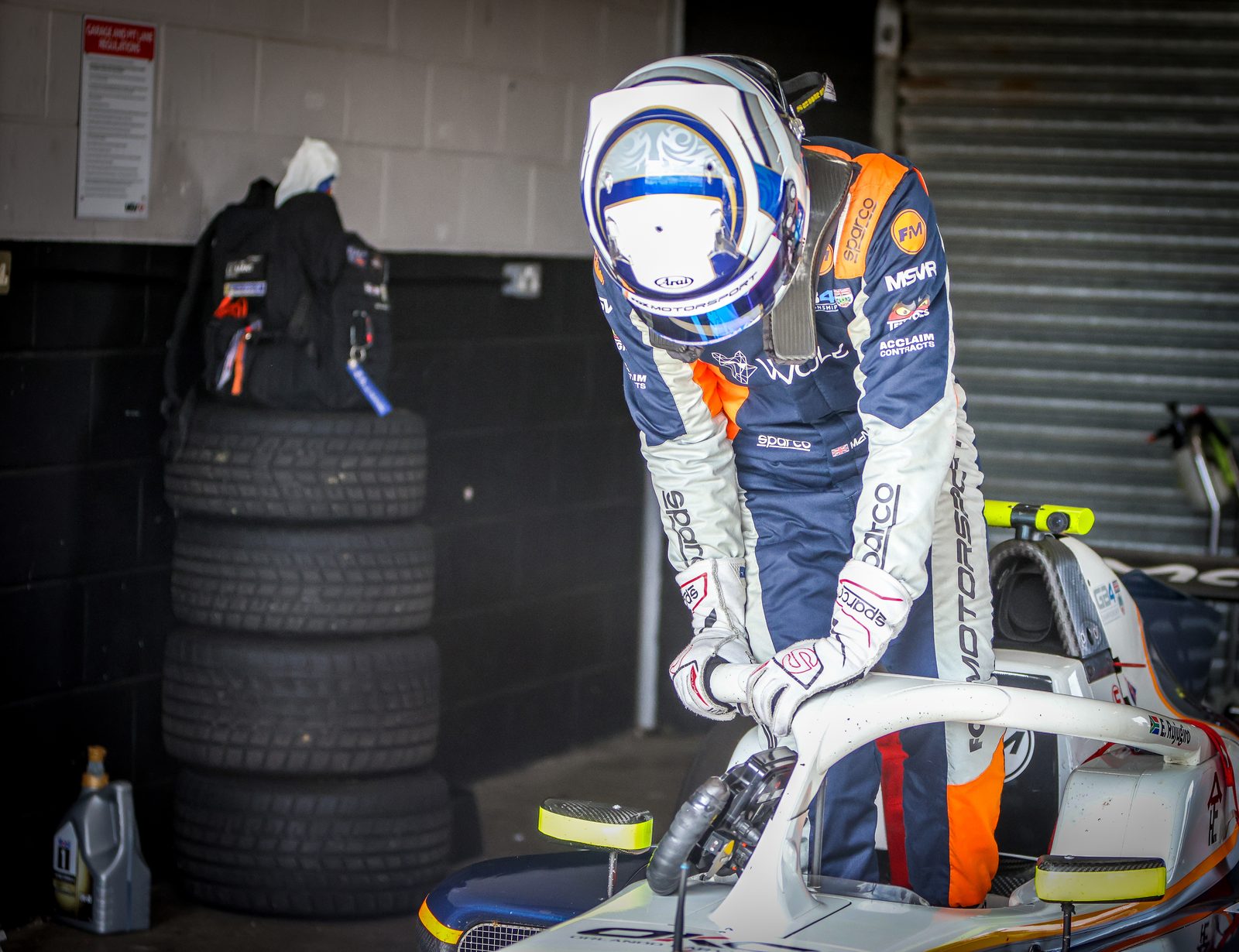 Robert Crawford climbing into the GB4 car